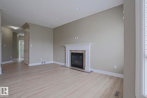 1456 33B Street Nw, Edmonton, AB - Indoor Photo Showing Living Room With Fireplace