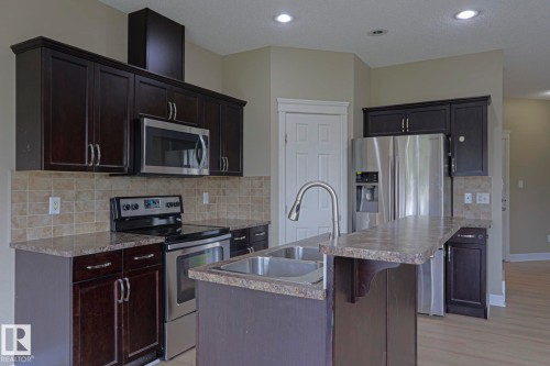 1456 33B Street Nw, Edmonton, AB - Indoor Photo Showing Kitchen With Double Sink With Upgraded Kitchen
