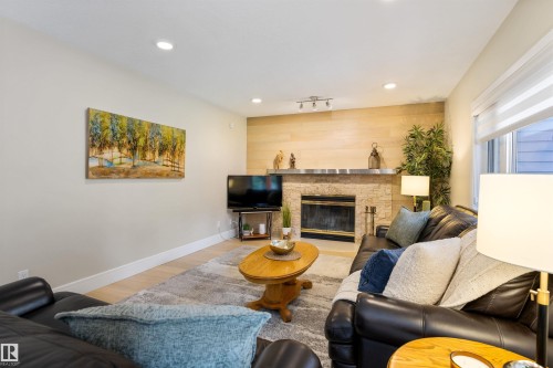 11 Arcand Drive, St. Albert, AB - Indoor Photo Showing Living Room With Fireplace