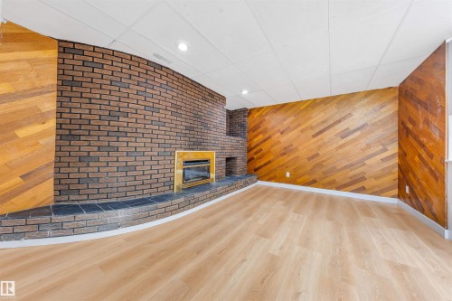 12023 137 Avenue Nw, Edmonton, AB - Indoor Photo Showing Other Room With Fireplace