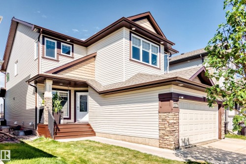 Modern two-story residence with a two-car garage, featuring stacked stone accents on the front facade - 2812 12 Street Nw, Edmonton, AB - Outdoor