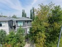 Multi-story property featuring dark gray siding and white trim - 15212 98 Avenue Nw, Edmonton, AB  - Outdoor 