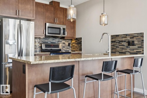 #808 10238 103 St Nw, Edmonton, AB - Indoor Photo Showing Kitchen With Upgraded Kitchen