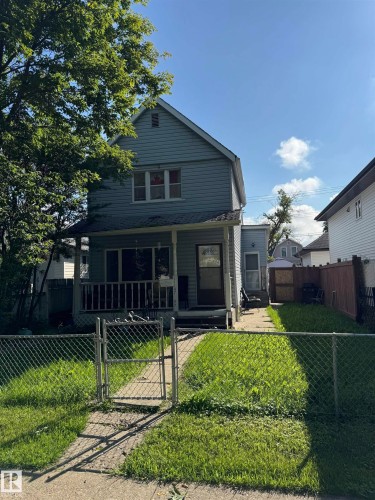 Two-story residence with light blue siding - 11147 97 Street Nw, Edmonton, AB - Outdoor With Deck Patio Veranda