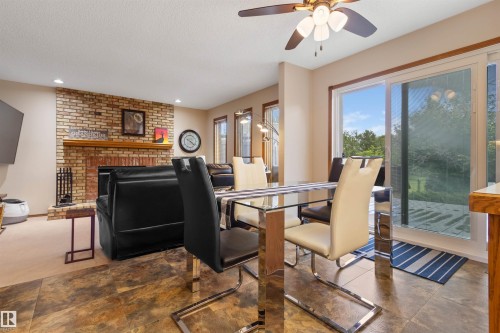 4705 Beckett Rd, Drayton Valley, AB - Indoor Photo Showing Dining Room With Fireplace