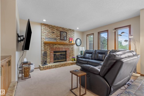 4705 Beckett Rd, Drayton Valley, AB - Indoor Photo Showing Living Room With Fireplace