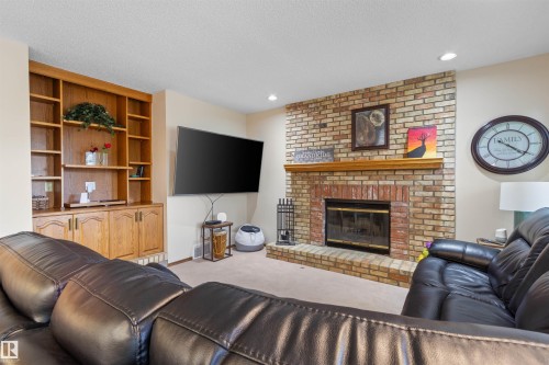 4705 Beckett Rd, Drayton Valley, AB - Indoor Photo Showing Living Room With Fireplace