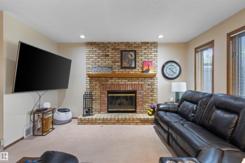 4705 Beckett Rd, Drayton Valley, AB - Indoor Photo Showing Living Room With Fireplace