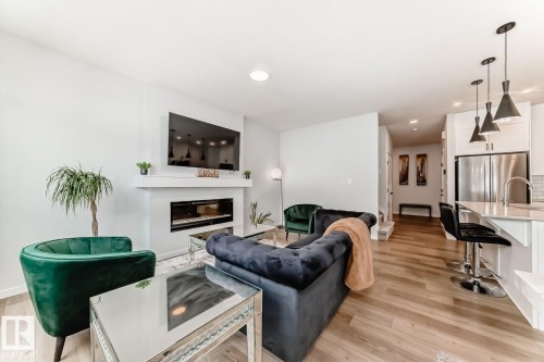 17764 73 Street Nw, Edmonton, AB - Indoor Photo Showing Other Room With Fireplace