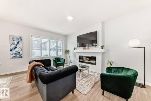 17764 73 Street Nw, Edmonton, AB - Indoor Photo Showing Living Room With Fireplace