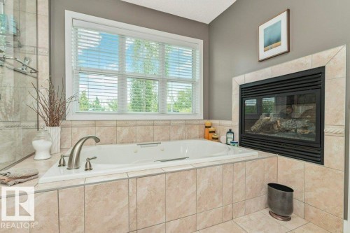 11009 131 Street Nw, Edmonton, AB - Indoor Photo Showing Bathroom With Fireplace