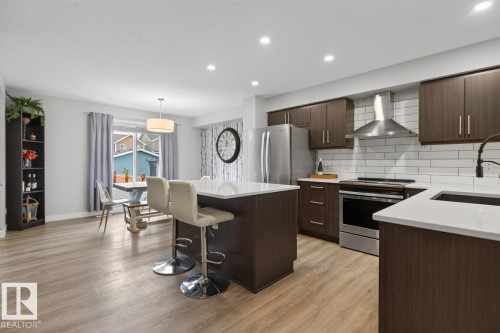 384 Stout Lane, Leduc, AB - Indoor Photo Showing Kitchen With Upgraded Kitchen