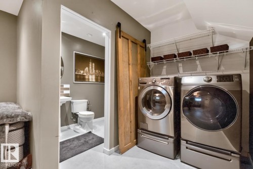 384 Stout Lane, Leduc, AB - Indoor Photo Showing Laundry Room