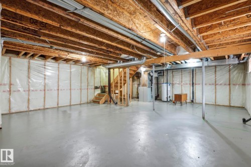 10719 8 Avenue Sw, Edmonton, AB - Indoor Photo Showing Basement