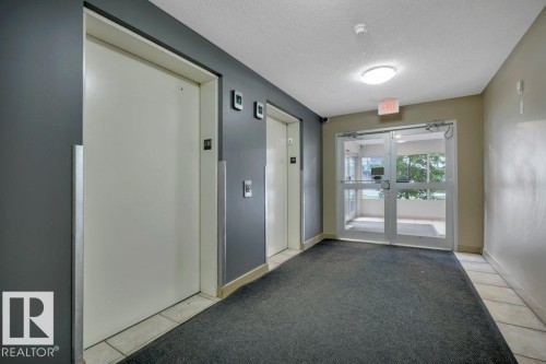 #122 17011 67 Av Nw, Edmonton, AB - Indoor Photo Showing Other Room