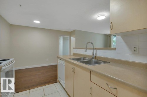 #122 17011 67 Av Nw, Edmonton, AB - Indoor Photo Showing Kitchen With Double Sink