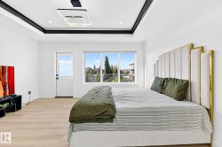 Recessed ceiling details with integrated lighting and a contemporary ceiling fixture - 