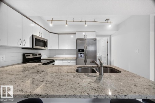 12126 47 Street Nw, Edmonton, AB - Indoor Photo Showing Kitchen With Double Sink With Upgraded Kitchen