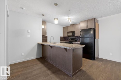 #123 6084 Stanton Dr Sw, Edmonton, AB - Indoor Photo Showing Kitchen