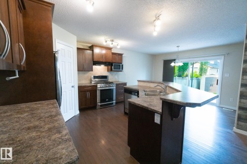 632 60 Street Sw, Edmonton, AB - Indoor Photo Showing Kitchen With Double Sink