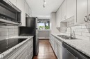#201 9725 82 Av Nw, Edmonton, AB  - Indoor Photo Showing Kitchen With Double Sink With Upgraded Kitchen 