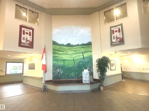 Image quality insufficient for description - #202 8802 Southfort Dr, Fort Saskatchewan, AB - Indoor Photo Showing Other Room