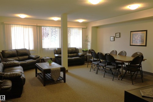 #415 12550 140 Av Nw, Edmonton, AB - Indoor Photo Showing Living Room
