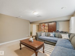 Recessed lighting and a flush mount light fixture illuminating the space - 