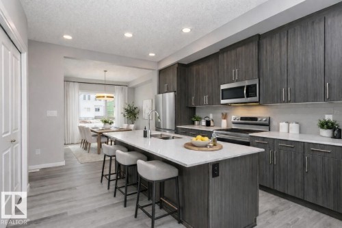 344 Hawthorn Way, Leduc, AB - Indoor Photo Showing Kitchen With Double Sink With Upgraded Kitchen