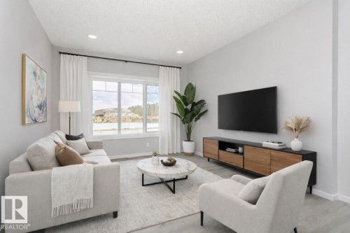 344 Hawthorn Way, Leduc, AB - Indoor Photo Showing Living Room