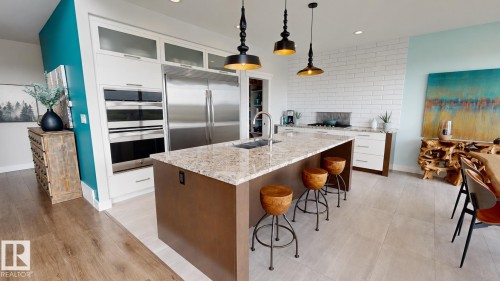 80 Ellison Court, Fort Saskatchewan, AB - Indoor Photo Showing Kitchen With Double Sink With Upgraded Kitchen