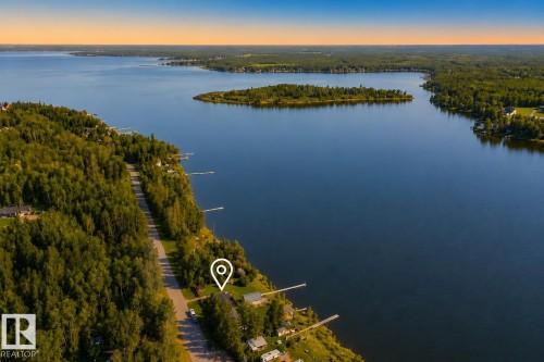 Waterfront property featuring extensive shoreline access - 264 Beach Avenue, Rural Barrhead County, AB - Outdoor With Body Of Water With View