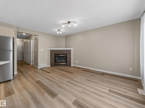 13003 101 Street Nw, Edmonton, AB - Indoor Photo Showing Living Room With Fireplace