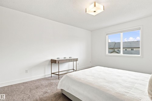 3741 Kidd Crescent Sw, Edmonton, AB - Indoor Photo Showing Bedroom