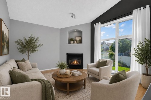 227 Wyman Lane Nw, Edmonton, AB - Indoor Photo Showing Living Room With Fireplace