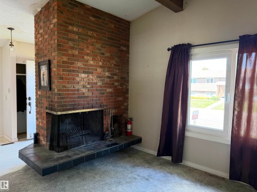 107 Mountain Ash Drive, Wetaskiwin, AB - Indoor With Fireplace