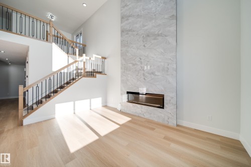7027 177 Avenue Nw, Edmonton, AB - Indoor With Fireplace