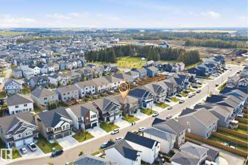 Aerial perspective of a developed residential neighborhood with paved streets - 3877 Chrustawka Place Sw, Edmonton, AB - Outdoor With View