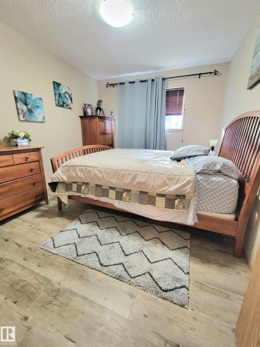 #108D 122 Westpark Dr, Fort Saskatchewan, AB - Indoor Photo Showing Bedroom