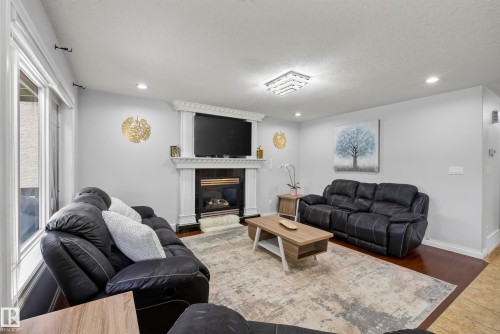 16604 59 Street Nw, Edmonton, AB - Indoor Photo Showing Living Room With Fireplace