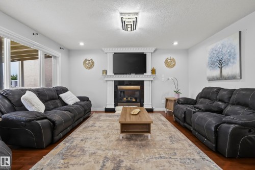 16604 59 Street Nw, Edmonton, AB - Indoor Photo Showing Living Room With Fireplace