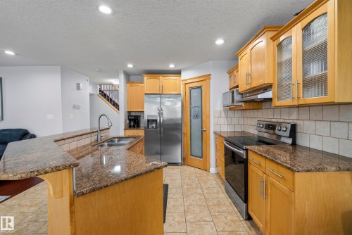16604 59 Street Nw, Edmonton, AB - Indoor Photo Showing Kitchen With Double Sink