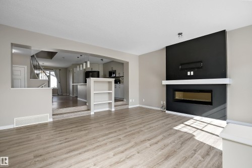 4037 Prowse Lane Sw, Edmonton, AB - Indoor Photo Showing Living Room With Fireplace
