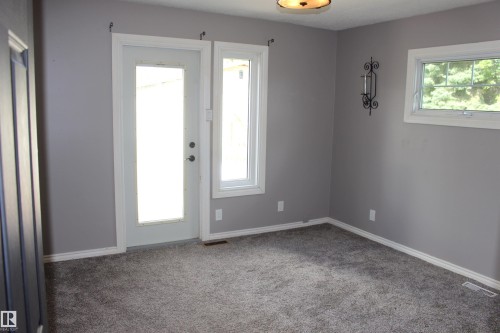 Plush gray carpeting, gray wall paint, and white trim - 49480 Rge Rd 41, Rural Leduc County, AB - Indoor Photo Showing Other Room