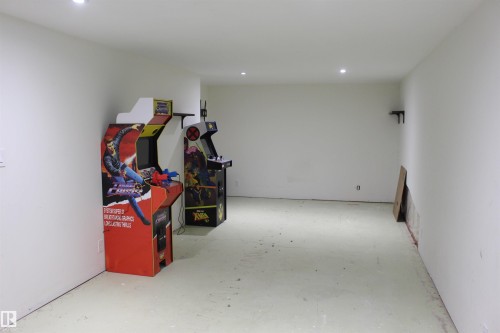 Recessed lighting illuminating a spacious room with a neutral color palette - 49480 Rge Rd 41, Rural Leduc County, AB - Indoor