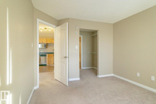 #409 5350 199 St Nw, Edmonton, AB - Indoor Photo Showing Other Room
