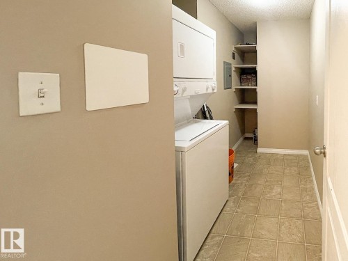 #409 5350 199 St Nw, Edmonton, AB - Indoor Photo Showing Laundry Room