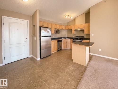 #409 5350 199 St Nw, Edmonton, AB - Indoor Photo Showing Kitchen