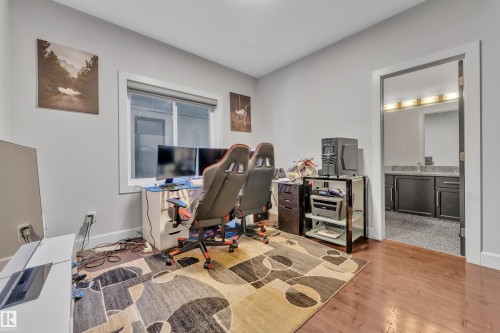 Hardwood-style flooring throughout - 10915 175 Avenue Nw, Edmonton, AB - Indoor Photo Showing Office