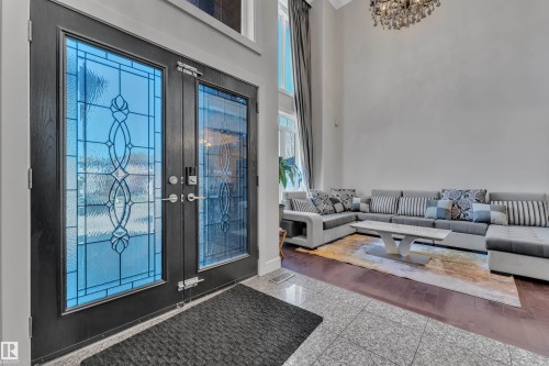 Double entry doors with decorative glass panels - 10915 175 Avenue Nw, Edmonton, AB - Indoor
